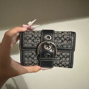 SOLD Rare Coach Soho Buckle Flap
Black Wallet